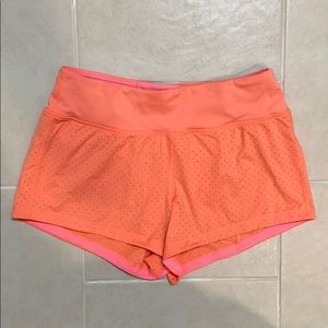 bright orange lululemon shorts